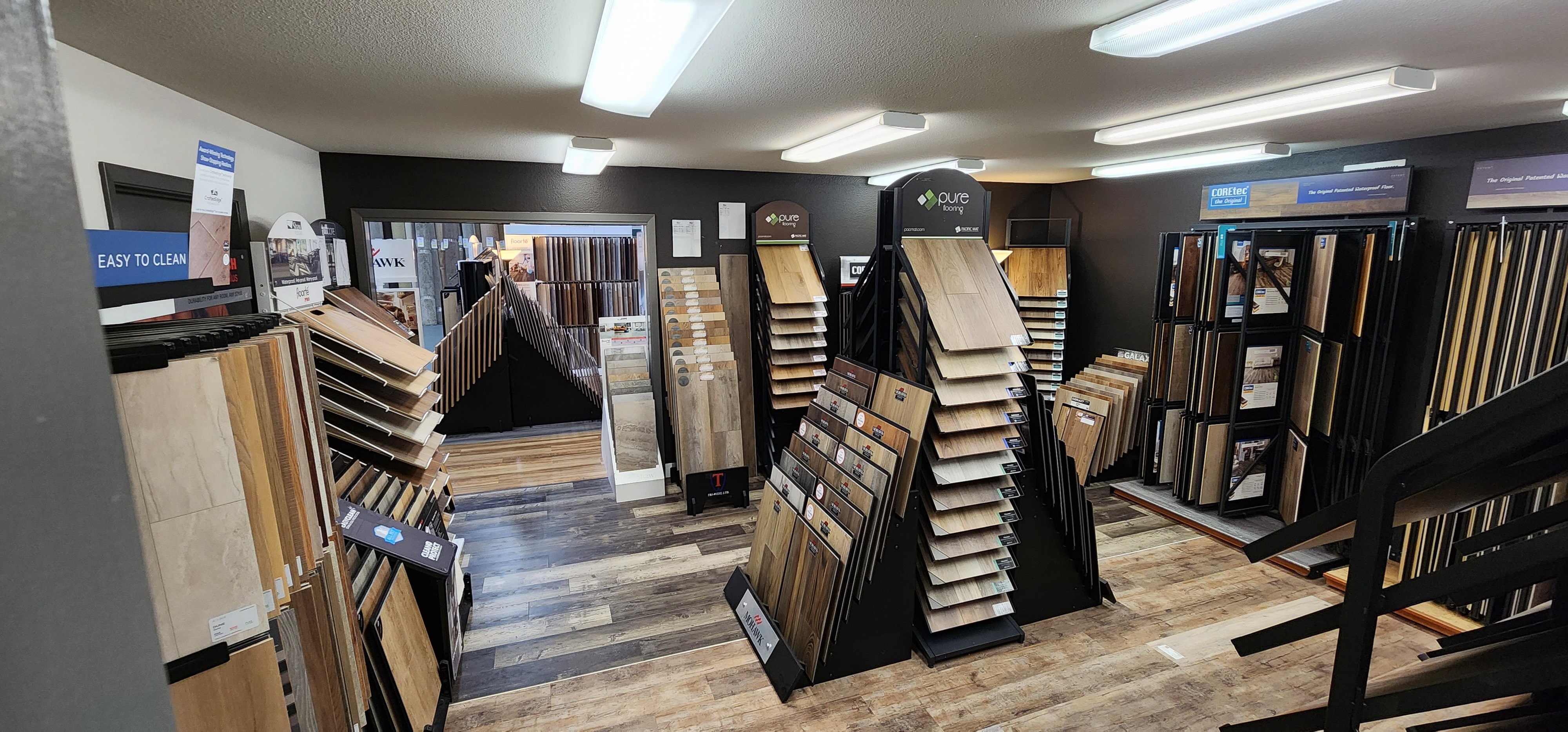 Variety of flooring products at showroom | Direct Flooring Center