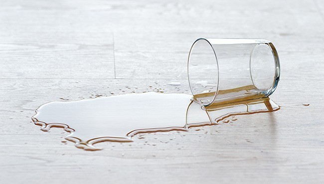 drinking glass fallen to the ground | Direct Flooring Center